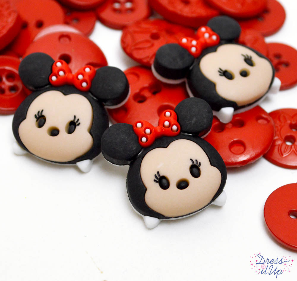 Adorable Minnie Mouse with a red bow adds to nursery decor and baby shower crafts