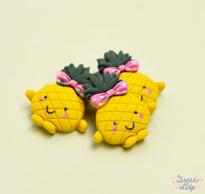 Smiling pineapples add cuteness to fruit themed projects and children's crafts