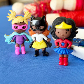 Tiny superhero girls are flying in to add to school projects, Halloween decor and children's crafts