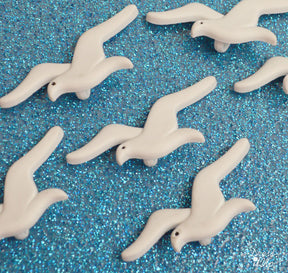 White seagulls are perfect for adding to beach and ocean themed crafts