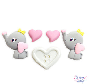 Cute baby elephants and hearts add to nursery decor and baby shower crafts