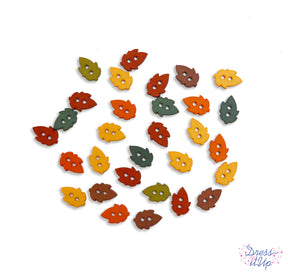 Tiny two-hole leaves in autumn colors are perfect to add to seasonal projects